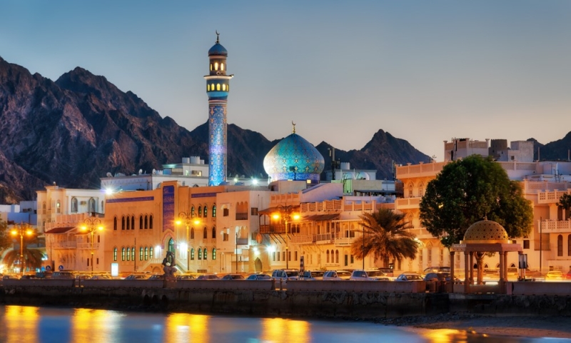 Mysterious Oman: dunes, forts, canyons and palm trees on the shore of the bay